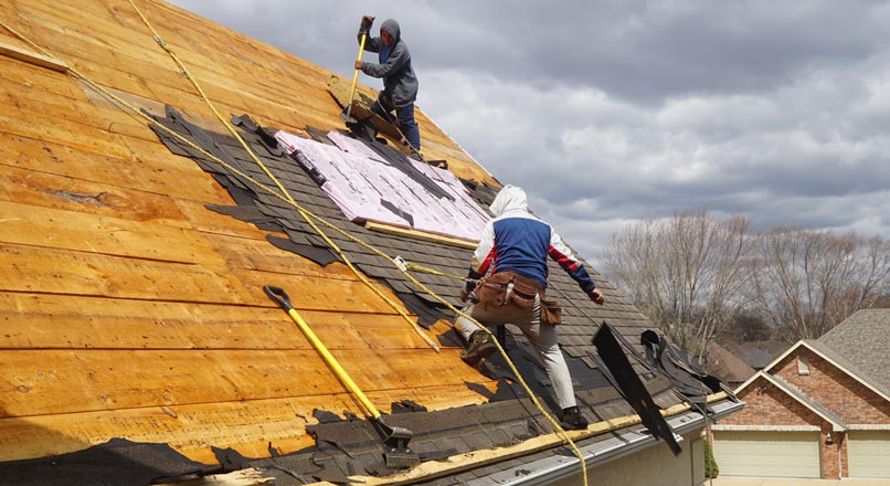 roofers working on roof